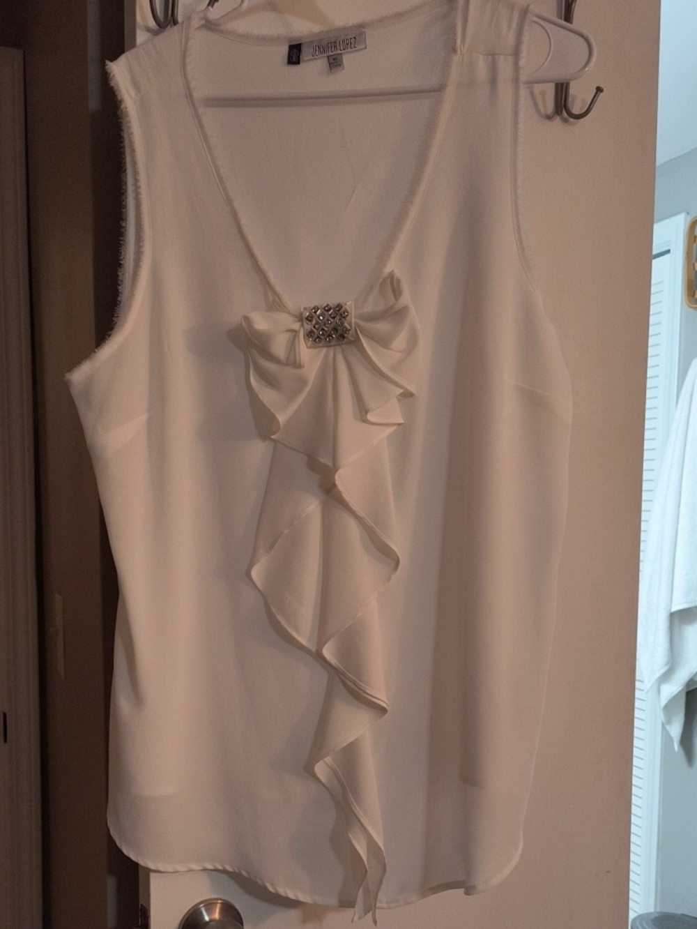 Jennifer Lopez Cream Ruffled Sleeveless Blouse with Jewel Accent